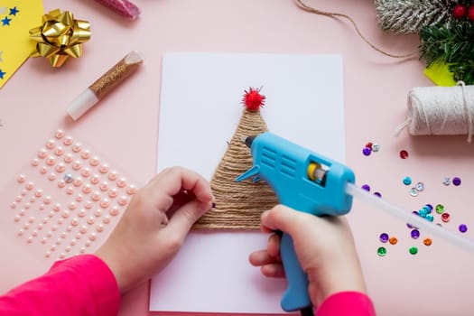 DIY concept. How to make Christmas card. New Year idea for children. Step-by-step photo instructions.