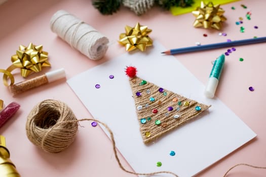 Making handmade christmas tree your own hands. Children's DIY concept. Making xmas toys decoration or greeting card.