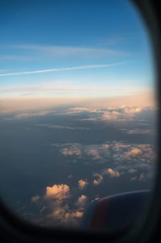 Clouds and sky from airplane window view