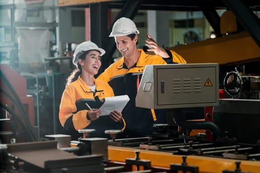 Professional quality control inspector conduct safety inspection on steel machinery and manufacturing process. Factory engineer or operator make optimization in heavy industry facility. Exemplifying