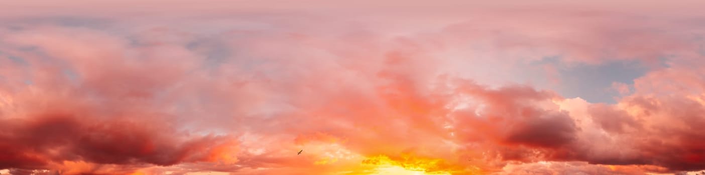 Sunset sky panorama with bright glowing pink Cumulus clouds. HDR 360 seamless spherical panorama. Full zenith or sky dome in 3D, sky replacement for aerial drone panoramas. Weather and climate concept