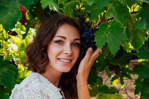 portrait of woman in grape leaves walk