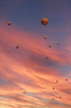 Landscape of Pamukkale park and a lot of hot air balloons in the morning sky . Turkey-october 2023. High quality photo