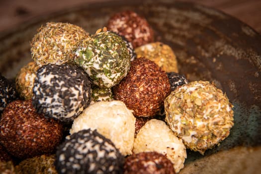 RECIPE FOR LABNEH CHEESE BOLLS WITH DRIED MINT, WHITE AND BLACK SESAME, SUMAC AND ZAATAR. High quality photo