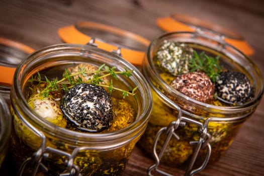 RECIPE FOR LABNEH CHEESE BOLLS WITH DRY MINT, BLACK AND WHITE SESAME, SUMAC AND ZAATAR IN A JAR WITH OLIVE OIL. High quality photo