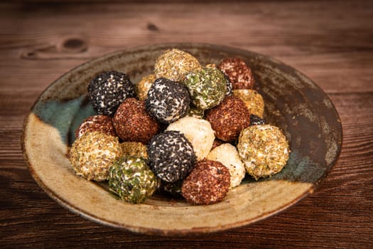 RECIPE FOR LABNEH CHEESE BOLLS WITH DRIED MINT, WHITE AND BLACK SESAME, SUMAC AND ZAATAR. High quality photo