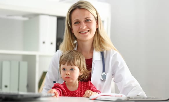 Little child at pediatrician reception. Physical exam appointment cute infant portrait, baby aid healthy lifestyle ward round child sickness clinic test high quality and trust concept