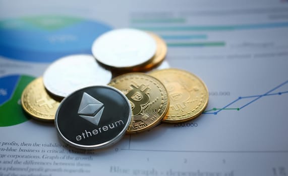 Silver ethereum jn chart paper closeup. Hard fork news consept