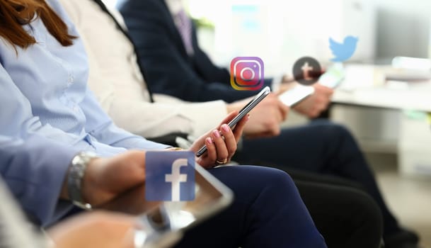 Minsk, Belarus - Jule 8, 2019: Group people using social media network. Illustartive editorial