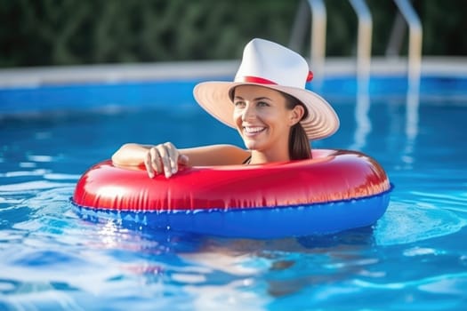 Christmas holidays on tropical destinations. woman in Santa Claus hat with inflatable ring relaxing in blue swimming pool. AI Generated