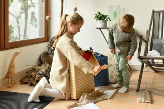 A child is surprised with a christmas present