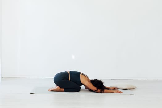 a classes stretching posture exercises woman doing yoga relaxation