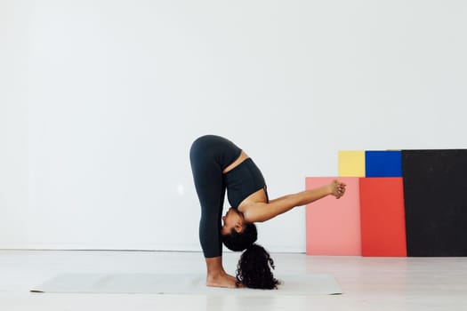 a classes stretching posture exercises woman doing yoga relaxation