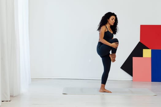 a classes stretching posture exercises woman doing yoga relaxation