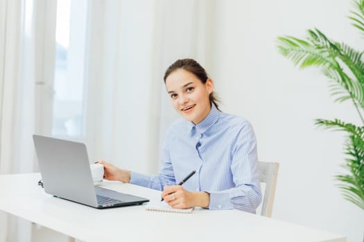 a woman with laptop at remote work internet conversation online communication