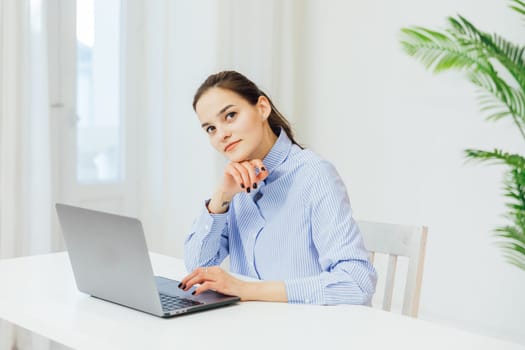 a woman with laptop at remote work internet conversation online communication communication