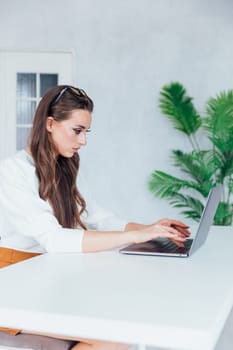 a woman with laptop computer remote work internet conversation online communication communication