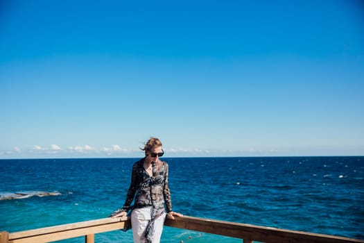 a woman on walk by the sea voyage