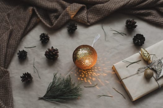 Christmas composition. Gifts, fir tree branches, red decorations