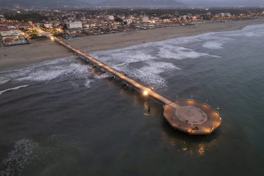 Night aerial photographic documentation of the pier of Marina di Pietrasanta Versilia Italy Tuscany 