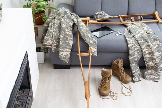 military uniform with crutches, disability.