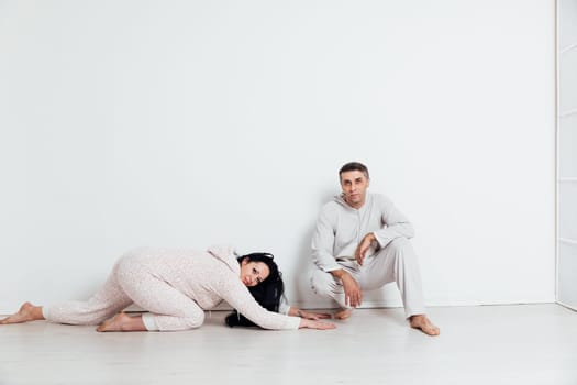 Man and woman couple in pajamas