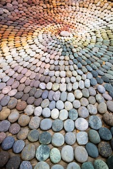 Photographic shot of the multicolor composition of a mosaic made of stones 