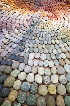 Photographic shot of the multicolor composition of a mosaic made of stones 