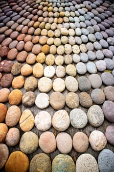 Photographic shot of the multicolor composition of a mosaic made of stones 