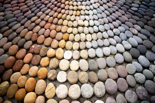 Photographic shot of the multicolor composition of a mosaic made of stones 