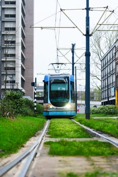 Discover the modern urban landscape of Rotterdam with its electric trams, a sustainable and convenient public transit system that enhances the city's mobility.