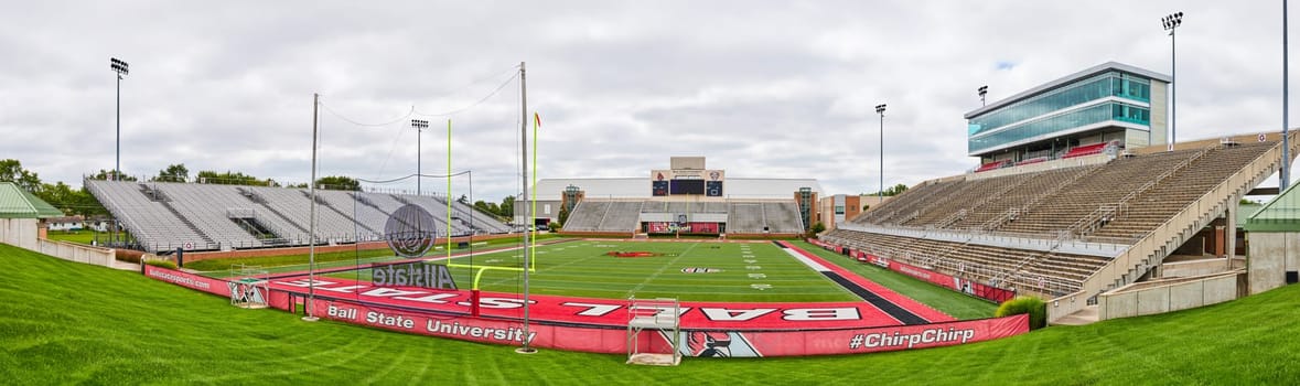 Image of Scheumann Stadium panorama entire stadium with Cardinals football field and empty bleachers