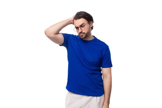 young smart european brunette man with beard concentrated on his thoughts.