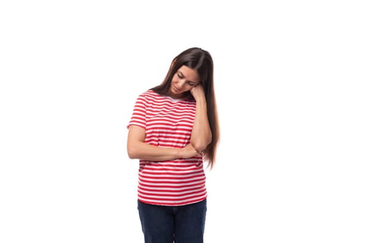 pretty upset young caucasian promoter woman with straight hair in glasses and in a striped red t-shirt is sad.