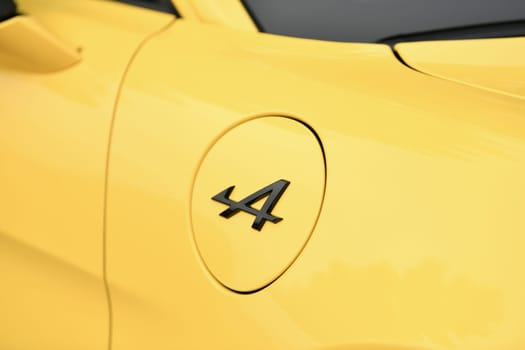 DIEPPE, FRANCE - MAY 14, 2023: Logo of Renault Alpine car classic Cars.