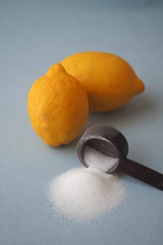 Coarse salt in a bowl on table .