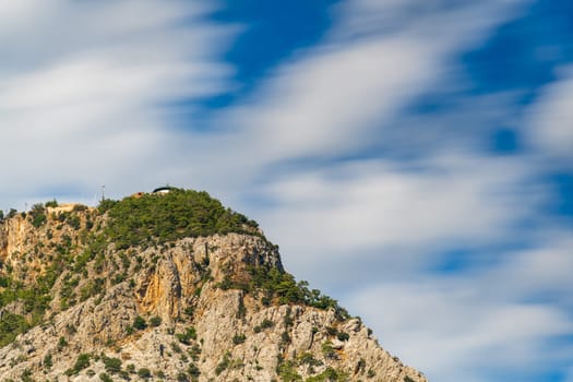 Photo taken with long exposure technique of Tunektepe mountain peak in Konyaaltı district of Antalya