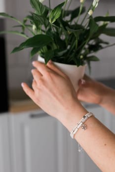 Close-up woman wearing beautiful luxury rings and bracelet. Handmade jewellery and accessories.