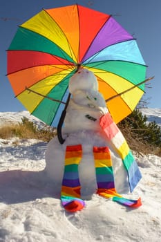 portrait, snowman with various colorful accessories lgtb pride, equality and freedom of expression concept,