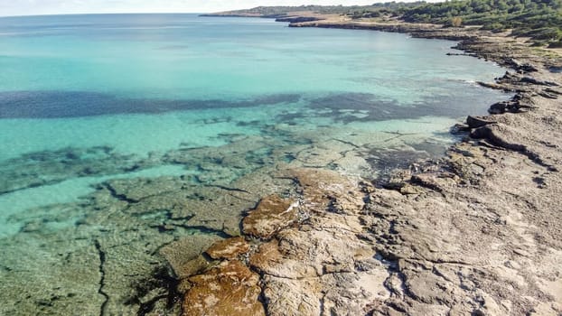 aerial view from drone of a natural paradise beach in the mediterranean, with crystal clear water and white sand. calamillor, Mallorca, Balearic Islands