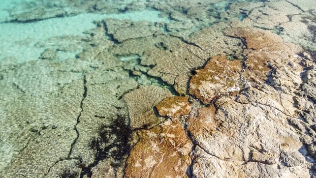 aerial view from drone of a natural paradise beach in the mediterranean, with crystal clear water and white sand. calamillor, Mallorca, Balearic Islands