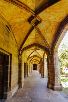 MELBOURNE, AUSTRALIA - NOVEMBER 19, 2023 - Ancient Law buildings of Old Quadrangle and architectural details at Melbourne University parkville campus in Melbourne, Victoria, Australia