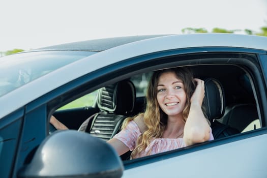 woman behind the wheel of a car car lady motorist trip