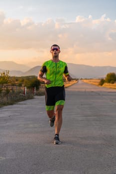 Triathlete in professional gear running early in the morning, preparing for a marathon, dedication to sport and readiness to take on the challenges of a marathon