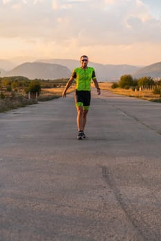 Triathlete in professional gear running early in the morning, preparing for a marathon, dedication to sport and readiness to take on the challenges of a marathon