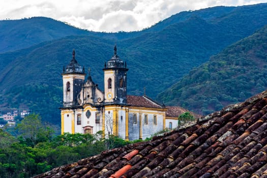 Old baroque church among the mountains in the city of Ouro Preto in Minas Gerais