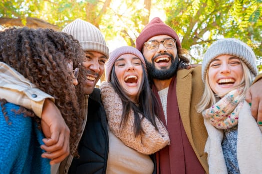 Cheerful group of friends taking selfie. Happy people having fun together outdoors on vacation holidays. Concept of community, youth lifestyle and friendship. High quality photo