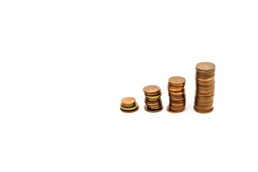 four stacks of coins forming steps up, isolated on white background,finance concept. High quality photo