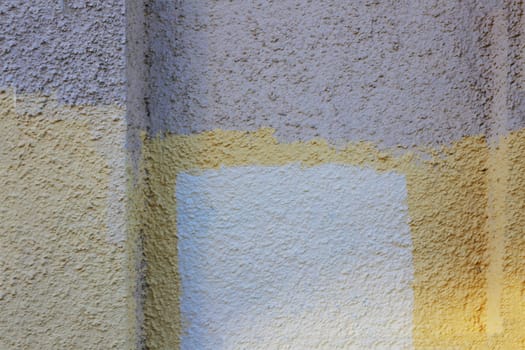 Wall painted with different colors. Texture with different colors.
