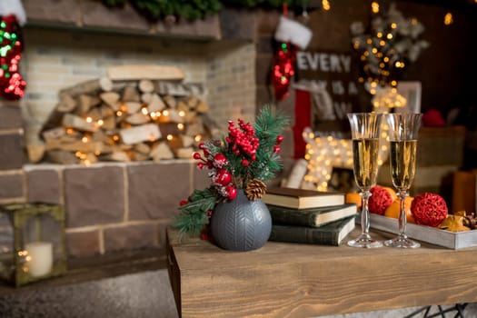 Picture of Christmas table setting, retro style photo, glasses for champagne, golden Christmastime decorations